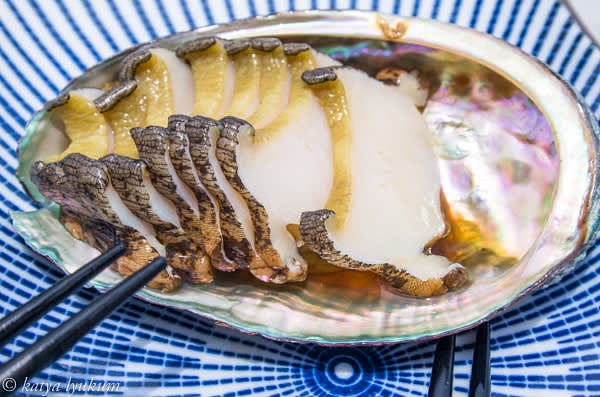 Large abalones are ready to slice and enjoy as sashimi.