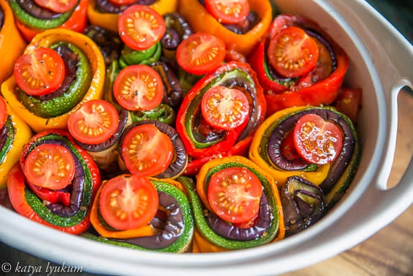 Spoon more tomato puree on top and arrange cherry tomato halves.