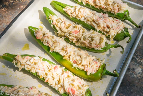 Combine breadcrumbs, eggs, mayo, mustard, and parsley. Add sauteed Hatch and picked crab meat and gently mix. Stuff peppers, cover with plastic wrap and refrigerate for at least 30 minutes.