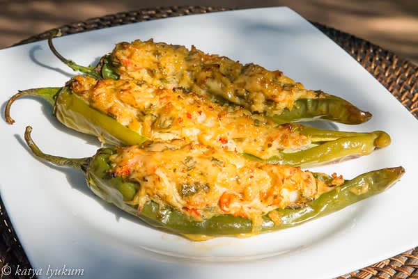 Preheat oven to 400F. Brush the top of the stuffing with some oil or mayo and bake for 35-40 minutes until light caramelization. Serve hot!