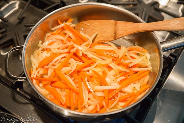 Saute carrots in melted butter for 1-2 minutes. Add onions.