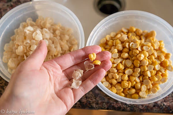 Measure 1 cup (240ml) of dry chickpeas. Place them into a container, add 4 cups of cold water, cover, and place in a fridge to soak for 24 hours. They are properly soaked if the skins are slippery and you can easily pop the beans out of their skins with your fingers.