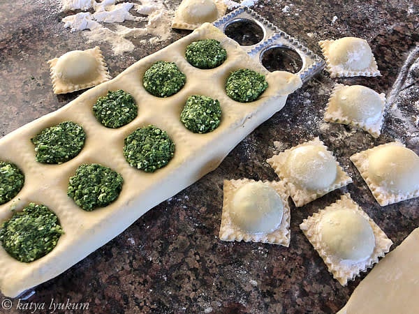 You can make handmade dumplings or use a ravioli maker. For the ravioli maker, divide the dough into 4 equal portions. Roll them the same size as the maker. Dust the maker with some flour and make dumplings.