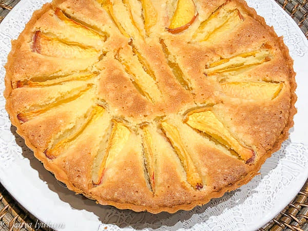 Bake tart for 35-40 minutes or until the frangipane is puffed and golden on the top. Let cool for 15 minutes and transfer to a wire rack to cool. The tart can be refrigerated for up to 2 days.
