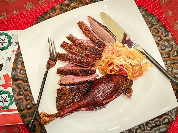 When the inner temp of the goose is 195-200F, it is ready to serve. It's a good idea to spray it with apple juice/cider/beer/wine for the last two hours of smoking. My favorite side dish for the smoked goose is sauteed cabbage (fresh and fermented combined) and caramelized onions. I usually top it with fresh herbs, scallions, and a few cranberries.