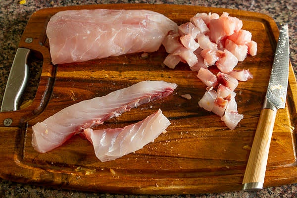 Cut the snapper fillet into uniform 1/2" or 1/3" cubes.