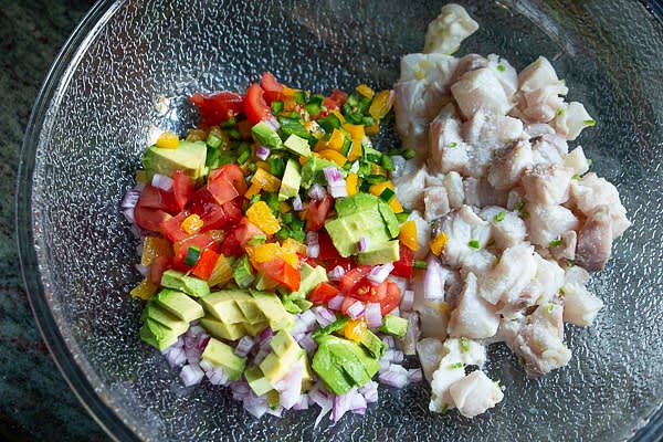 Strain marinade. In a bowl, combine fish and vegetables. Taste and adjust seasoning if needed.