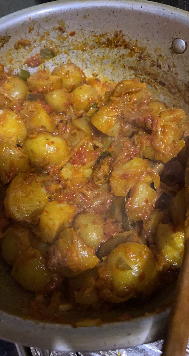 Add the mix pickle and squeeze half of a lemon. Add the boiled patatoes mix well.