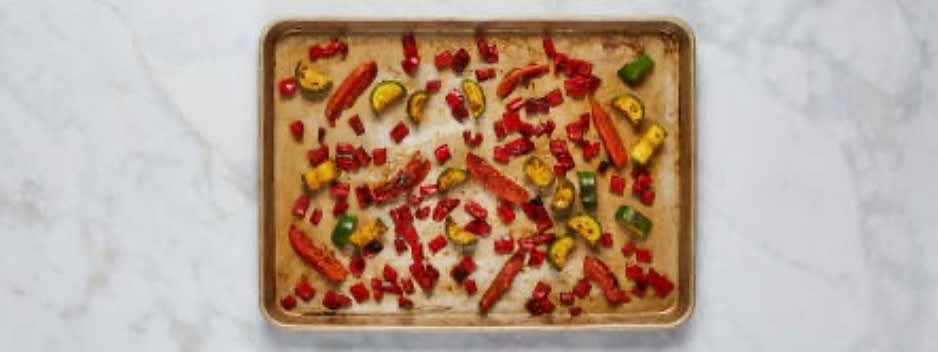 Toss zucchini, bell pepper, and tomato on a baking sheet with a large drizzle of olive oil, 1 tsp Tuscan Heat Spice (you'll use the rest later), salt, and pepper. (For 4 servings, divide veggies between 2 sheets; roast on middle and top racks.) Roast on middle rack until browned and tender, 20-25 mins.