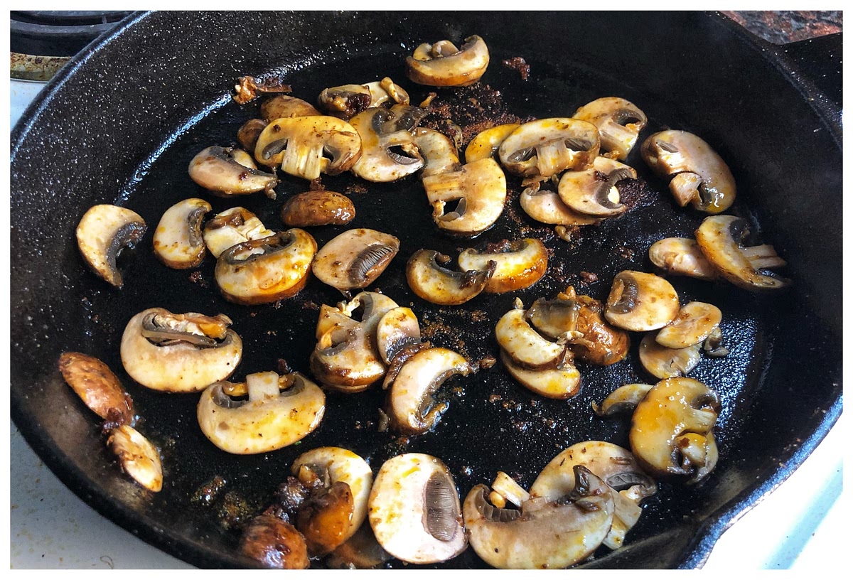 Put mushrooms into the pan and sauté in the seasoned oil.