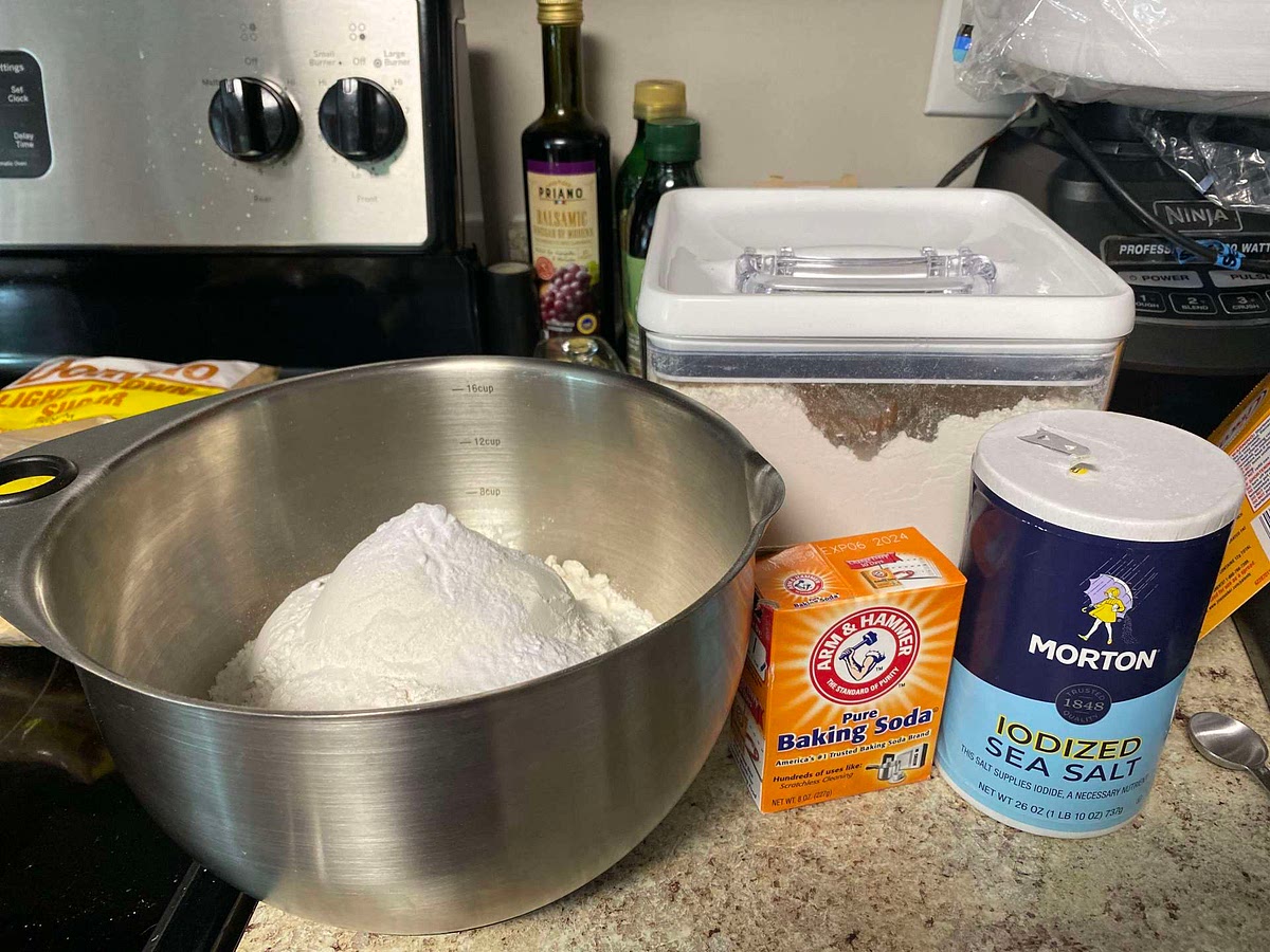 In a medium bowl, stir flour, salt, and baking soda.