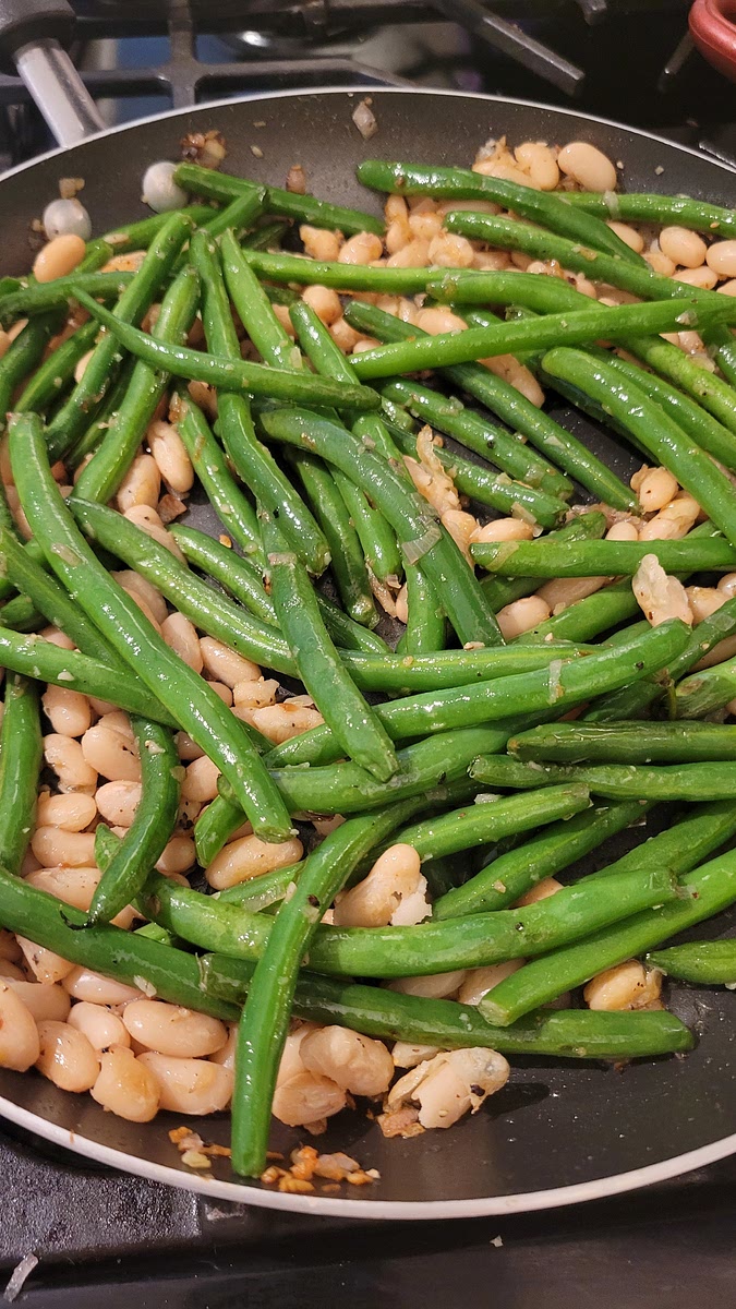 Add in white beans, salt, and pepper. Stir to combine all ingredients