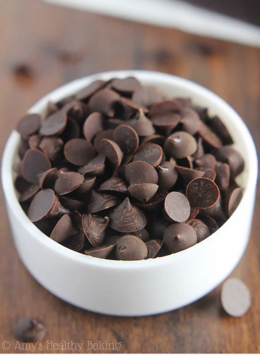 Drop in your strawberries and chocolate chips to add flavor and texture. You can eat right away or let it firm up some in the freezer.