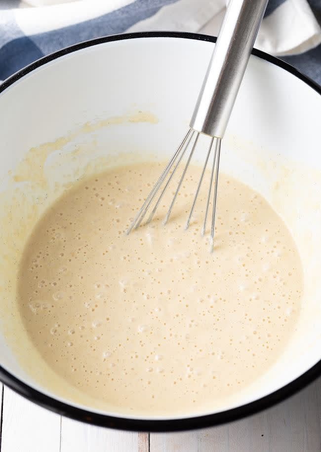 In a bowl, add: 1 cup of milk, 2 tablespoons of vegetable oil, and 1 egg. Mix those together well