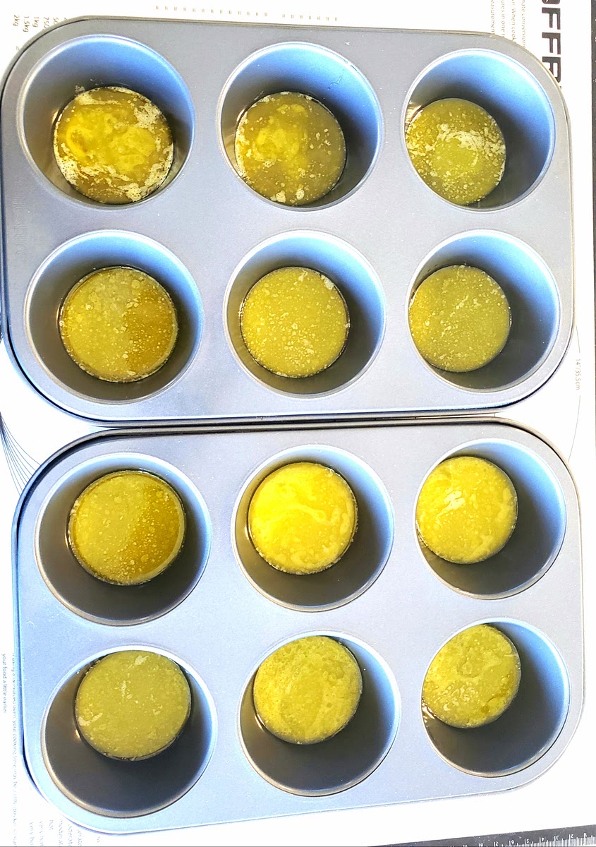 One large tin pastry pan put 1 Tbs melted butter in each tin. Then cut out large circles of pastry and line each pastry tin. (Should be 12 in a pan) set aside in a cool area