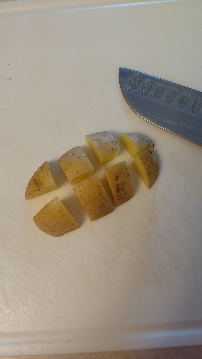 Halve potatoes. Halve the halves lengthwise. Slice thickly about 1 inch (about 5 slieces)