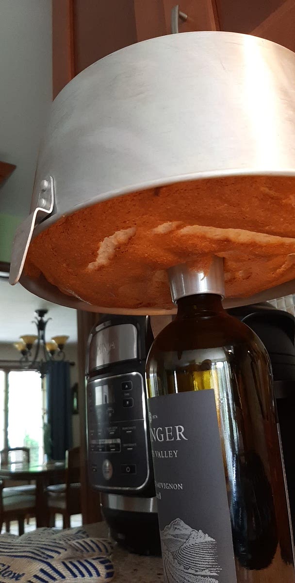 Cool for 5 minutes and then invert onto a bottle to cool completely