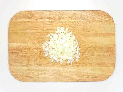 Preheat the oven to 220°C/ 200°C (fan)/ gas 7 Boil half a kettle Peel and finely chop the brown onion[s]