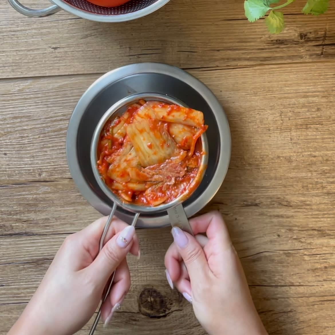 Using well fermented (ripened) kimchi, strain or squeeze out the liquids (juices)