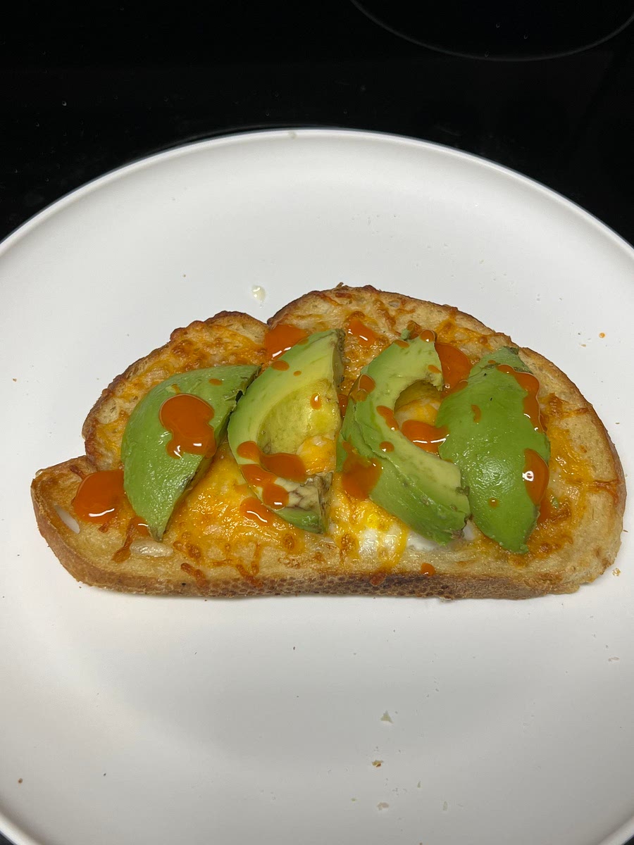 Add hot sauce and avocado, and enjoy!