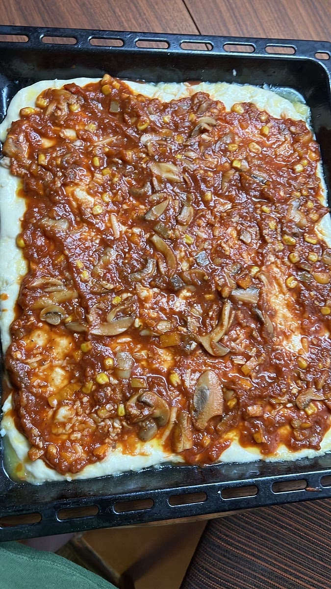Put your sauce and place the pan in the middle rack of the oven on the highest setting your oven has