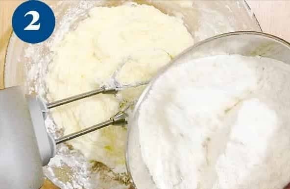 In the bowl of a stand mixer with the paddle attachment cream the butter and powdered sugar for just a few seconds. Add vanilla extract. Followed by the flour mixture.