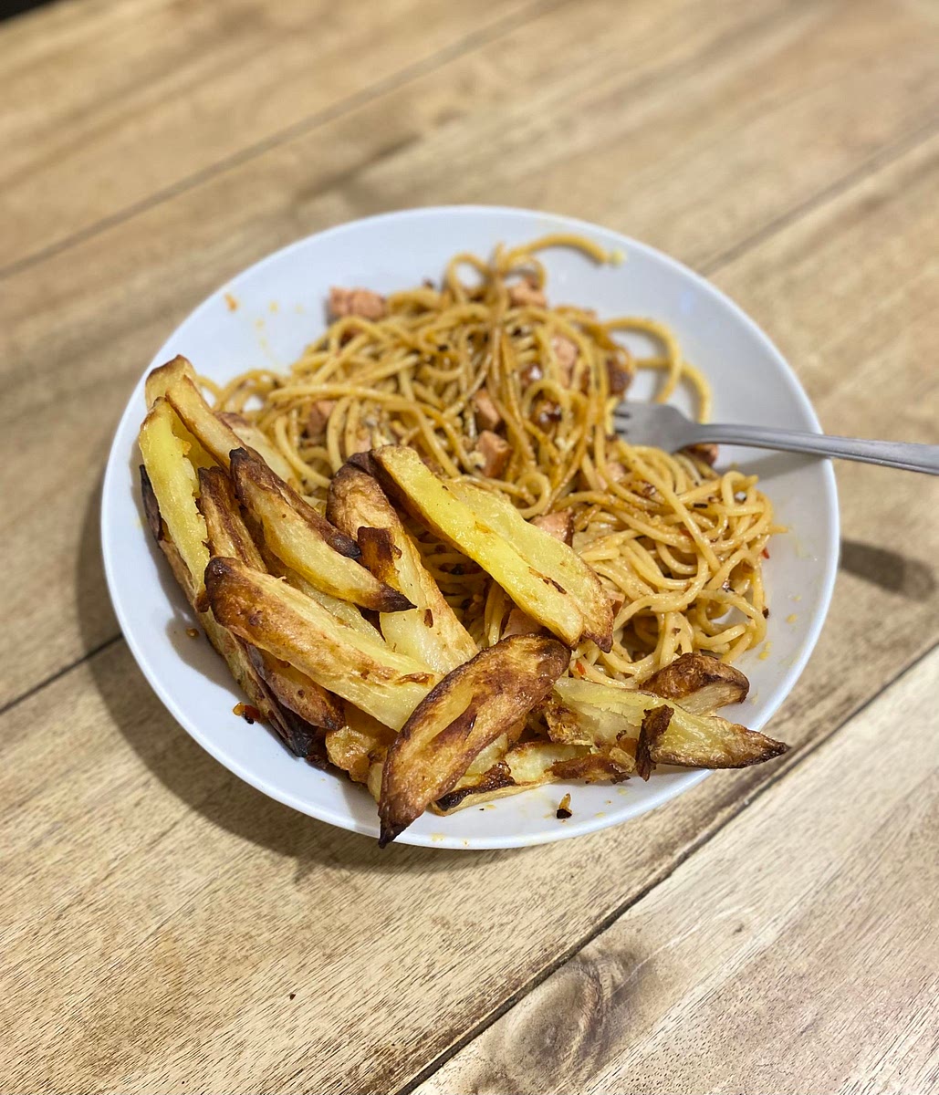 Lastly, once the spaghetti has turned light brown plate it up and serve with some homemade wedges