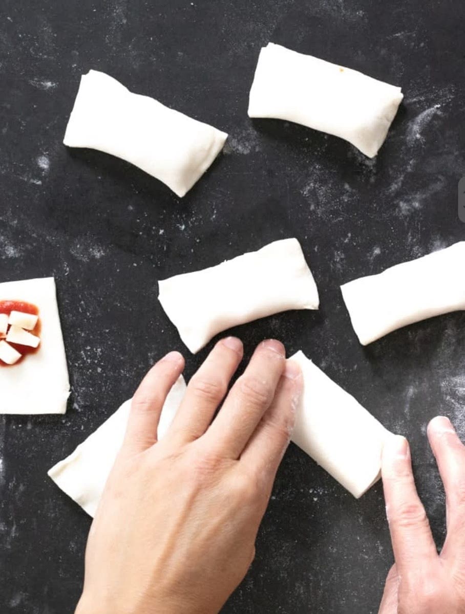 fold the pastry over on itself and brush with egg wash