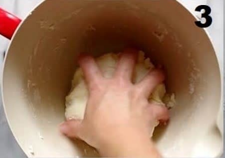 use your hands to work the dough together into a ball