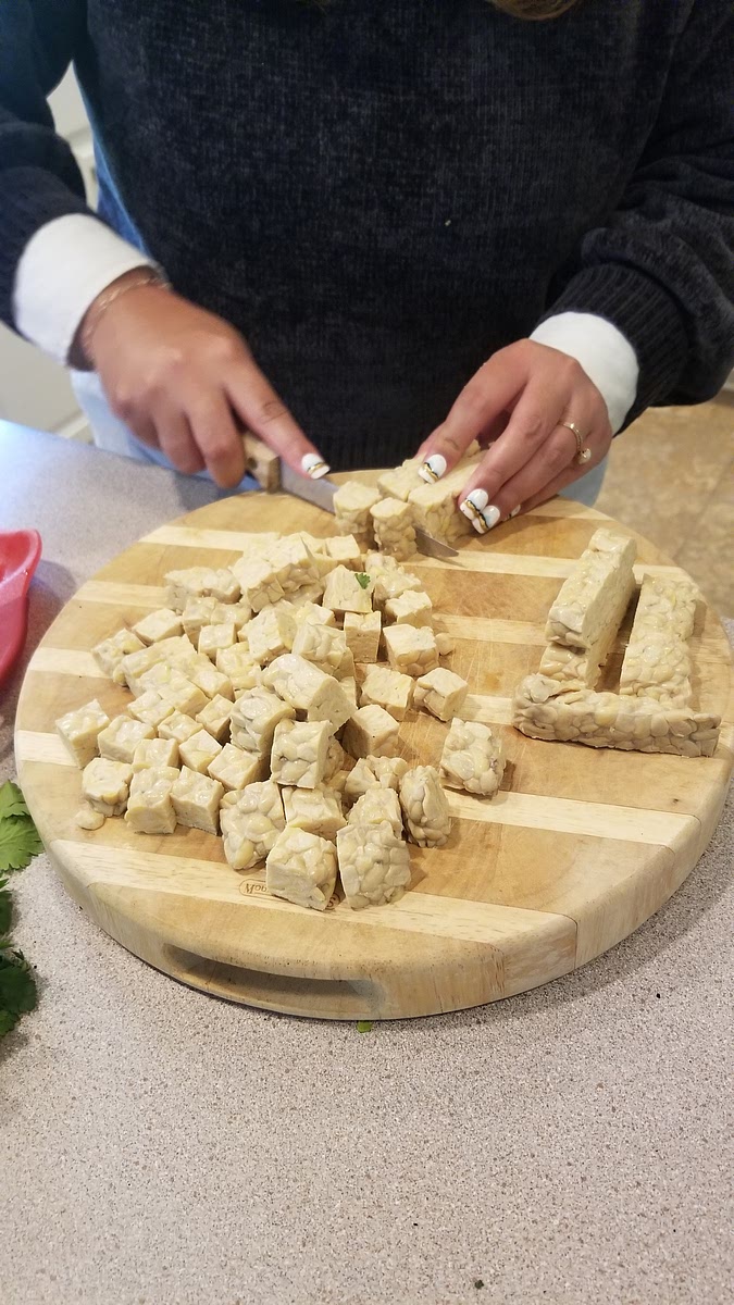 Dice the tempeh and red onion. The tempeh should be the size of game dice.