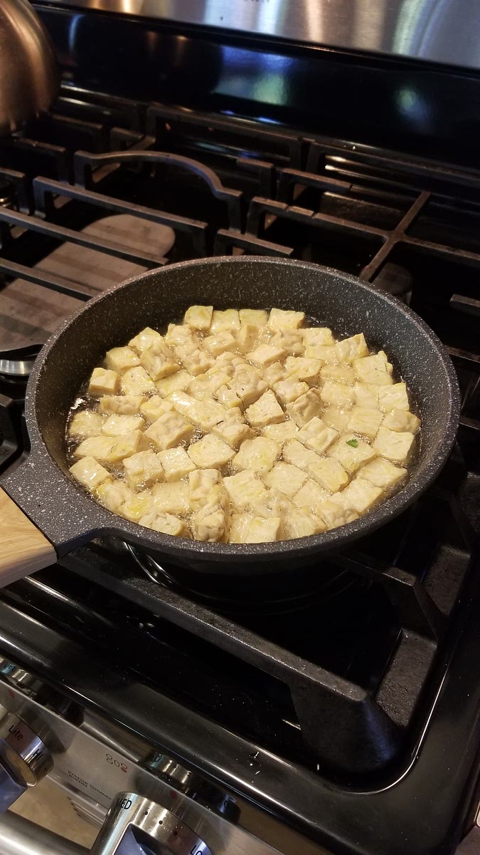 Add tempeh to the oil once it's hot and cook on medium/low heat.