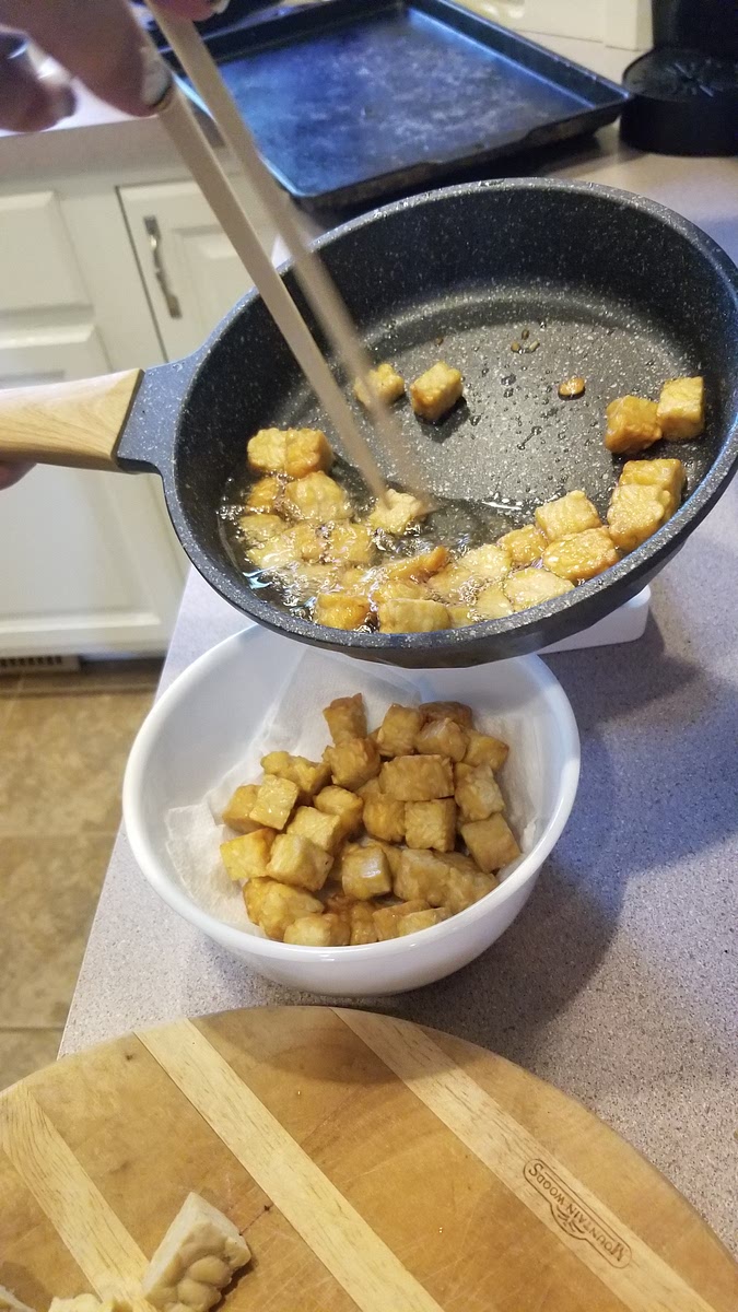 Separate the tempeh from the oil and lay them on paper towels. (And save the oil.)