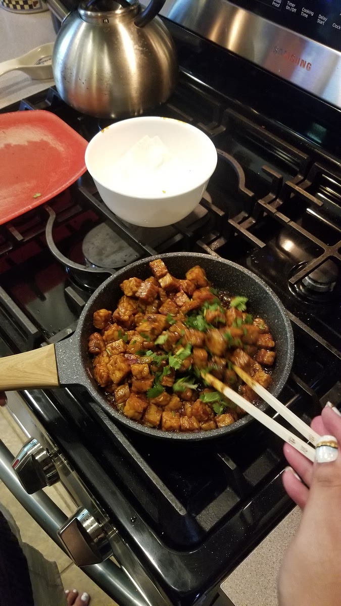 Sprinkle the coriander over the tempeh, remove from heat, and mix.