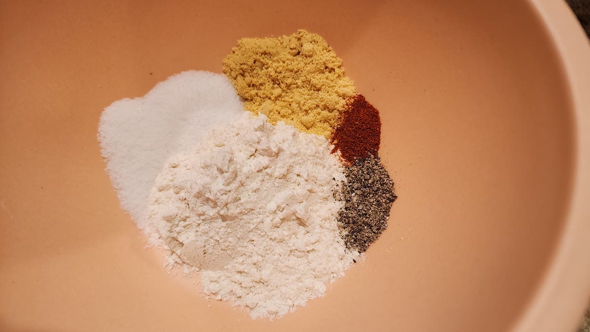 1. Add dry ingredients to a large bowl & mix well (flour, dry mustard, salt, pepper, nutmeg, cayenne pepper)