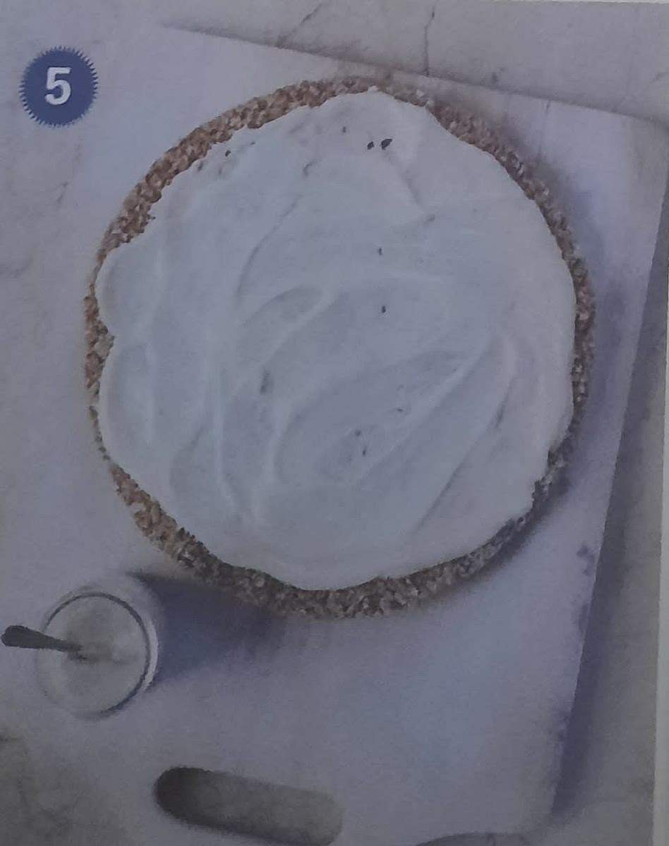 spread the yogurt evenly all over the top of the cooked crust
