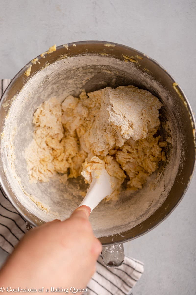 Mix together, in a separate bowl, the butter, white and brown sugar and the egg.