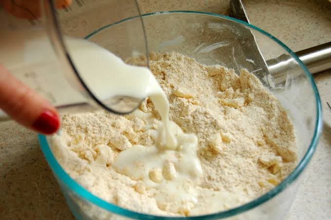 Add curd milk to the bowl