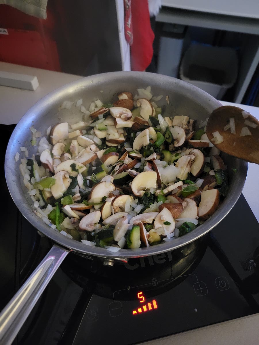 Add Mushrooms Onion and Garlic, cook until mushrooms have shrink down and onions are cooked.