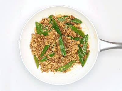 Once fragrant, add the tomato paste, a pinch of sugar and a small splash of water to the pan and mix until everything is combined Squeeze the pouch[es] of steamed white basmati rice to separate the grains Add the basmati rice to the pan, breaking it up with a wooden spoon as you go and give everything a good mix up