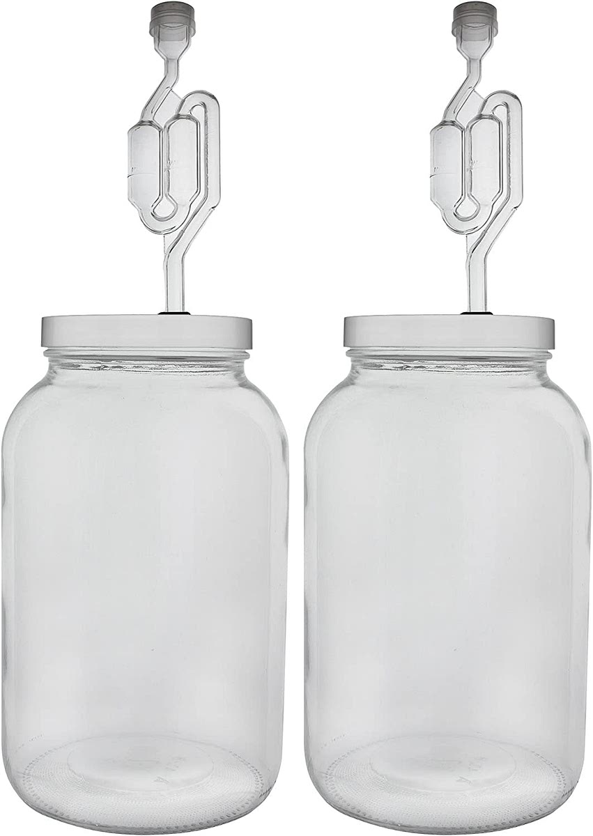 Cover the jars with lids with an airlock (pictured). If you don't have lids with an airlock, burp the jars two or more times a day to keep them from turning into pickley grenades.
