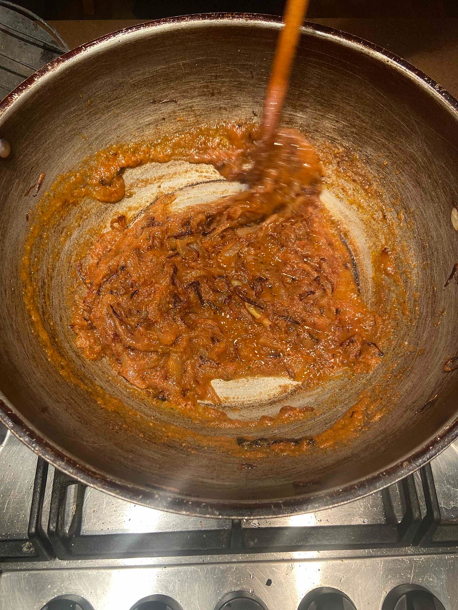 Add tomato mix to the pan and stir well