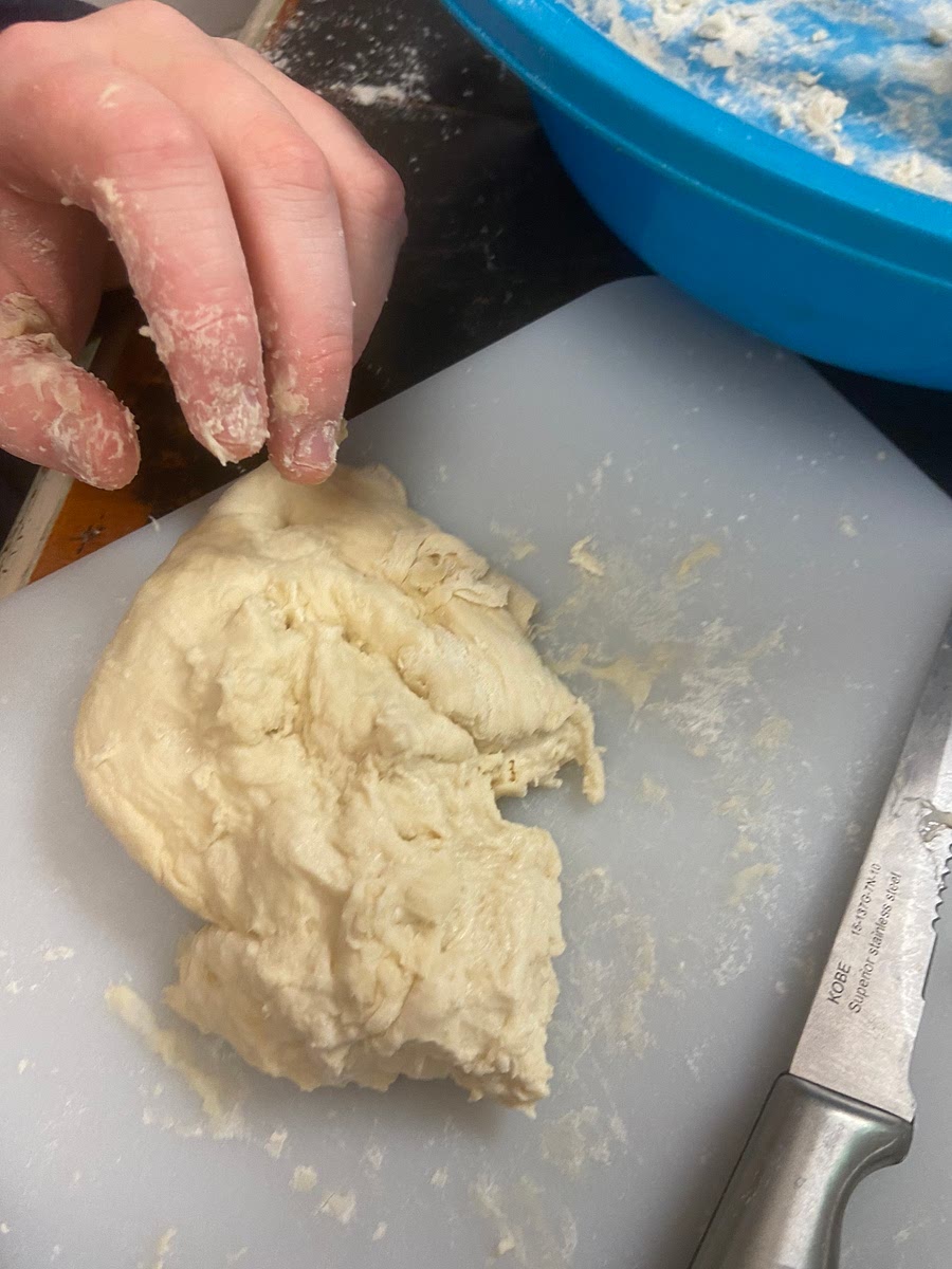 On a lightly floured parchment paper, roll out the dough as thin and even as possible. Use more flour if you need to.