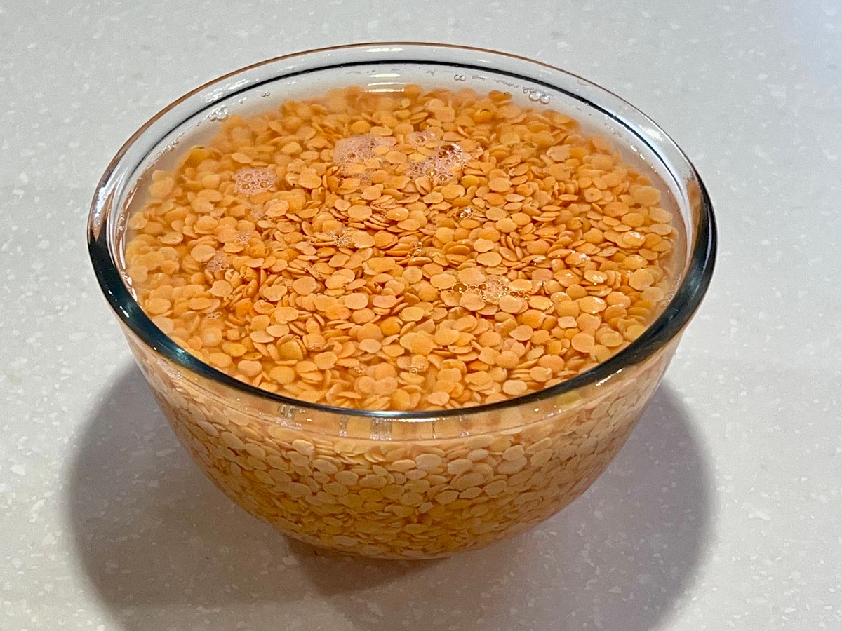 Place cleaned lentils into a bowl with fresh water and leave to soak for 1 hour