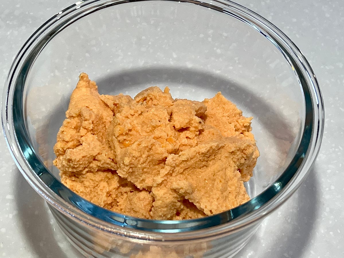 Blend half of the red lentils until it forms a smooth paste