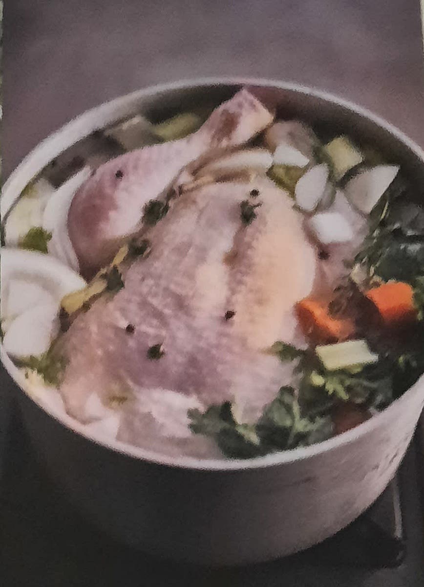 place the whole chicken, vegetables, herbs and peppercorns in a large pot and cover with cold water