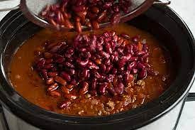 Add the drained beans and cook, stirring occasionally for at least another 10 minutes.