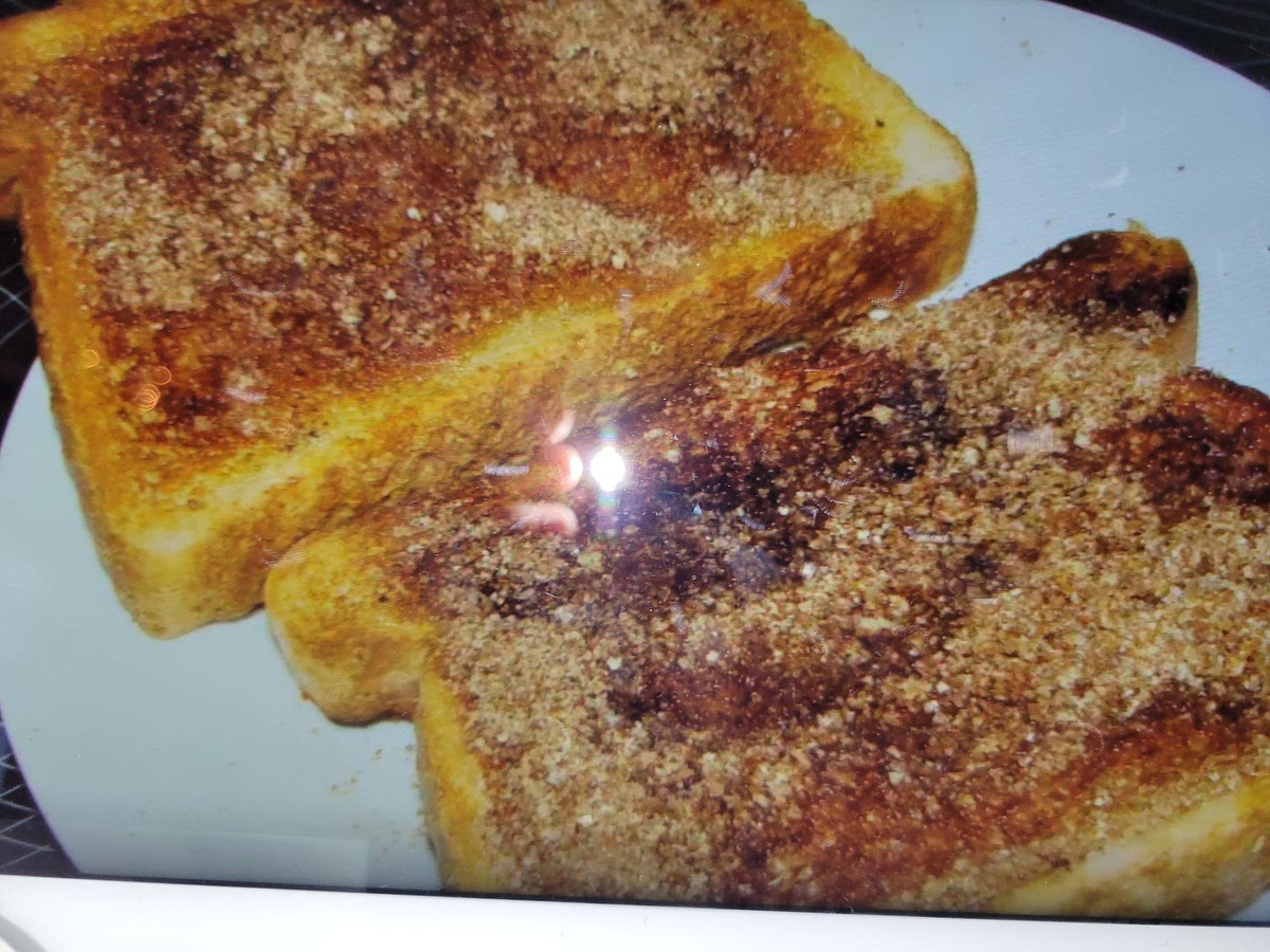 Toast the bread in the toaster.