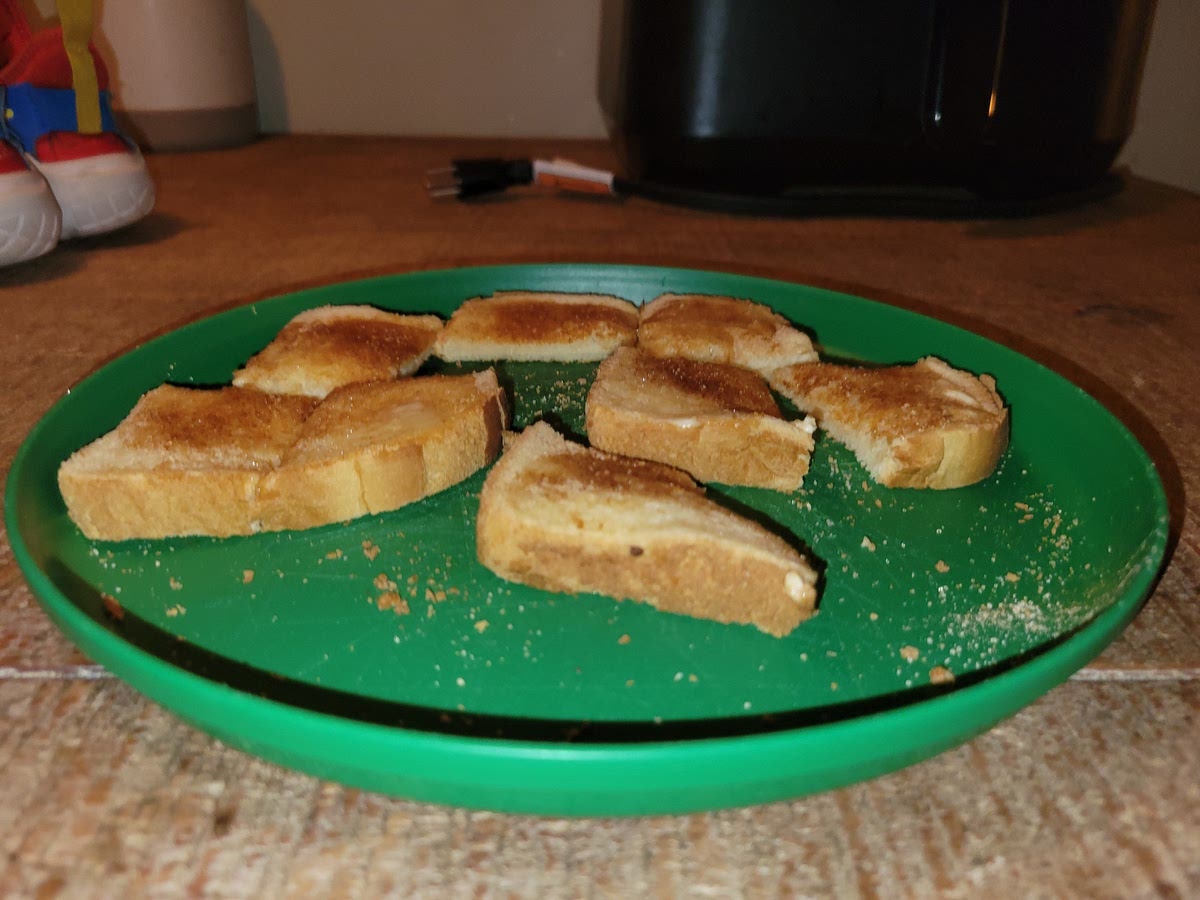 Sprinkle the cinnamon sugar on the toast.