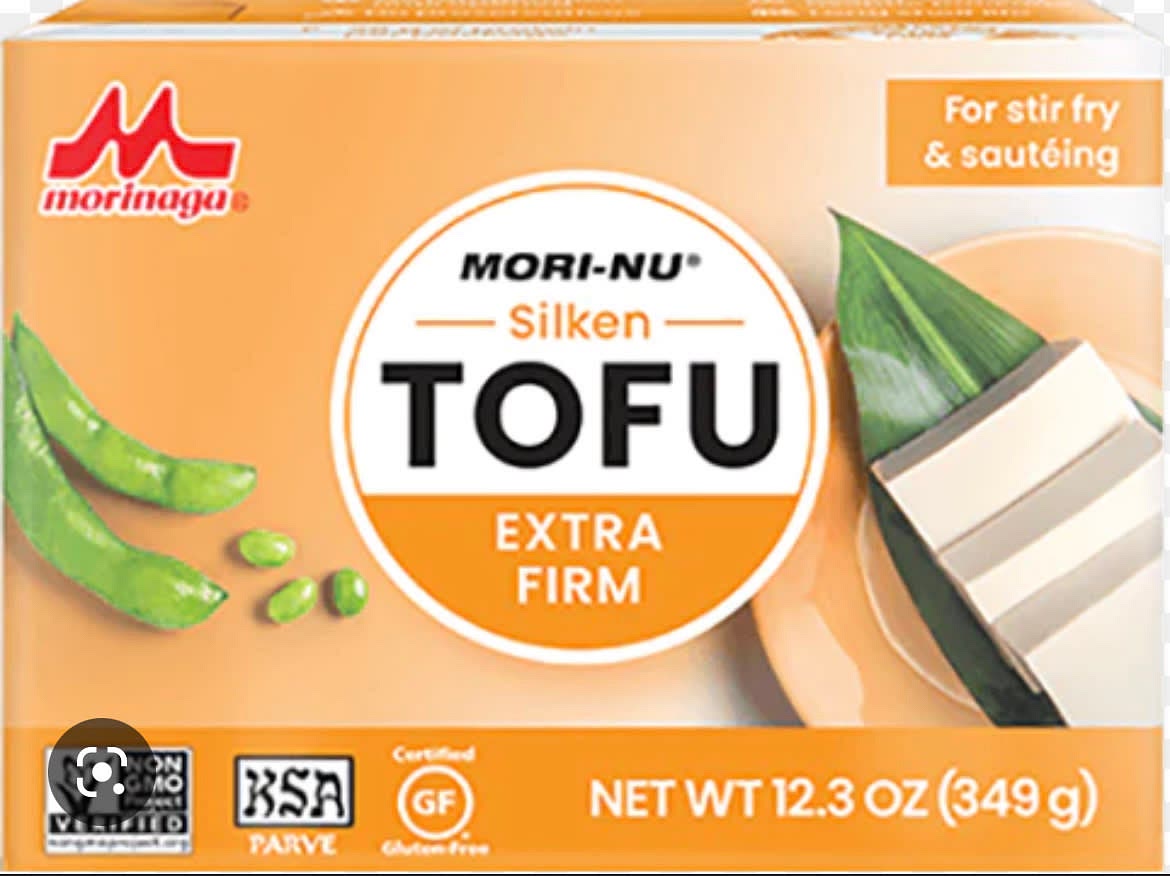 In the last few minutes, add in silken tofu blocks. The brand in the picture is the one I prefer