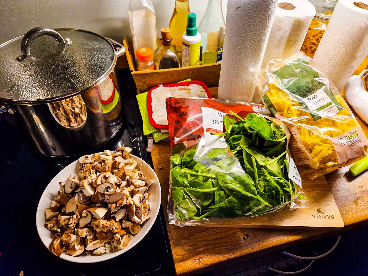 2) while your pasta is cooking, prep your ingredients for the sauce - slice your onion, garlic and mushrooms